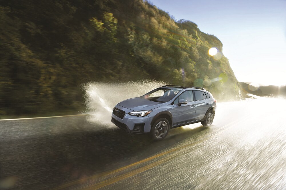 Subaru Crosstrek Driving up the Mountain