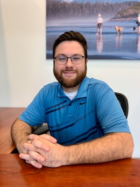 Staff member Ryan M from 7c708338130f