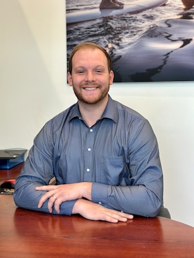 Staff member Samuel C from 7c708338130f