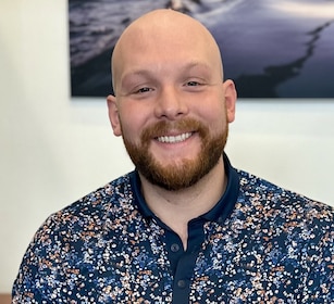 Staff member Samuel C from 7c708338130f