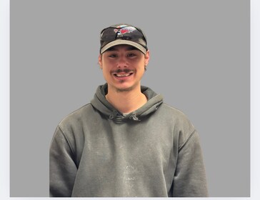 Staff member TJ Gill from ID_a8dfa614a656