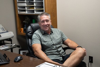 Staff member BRYAN KIRK from ID_90d126