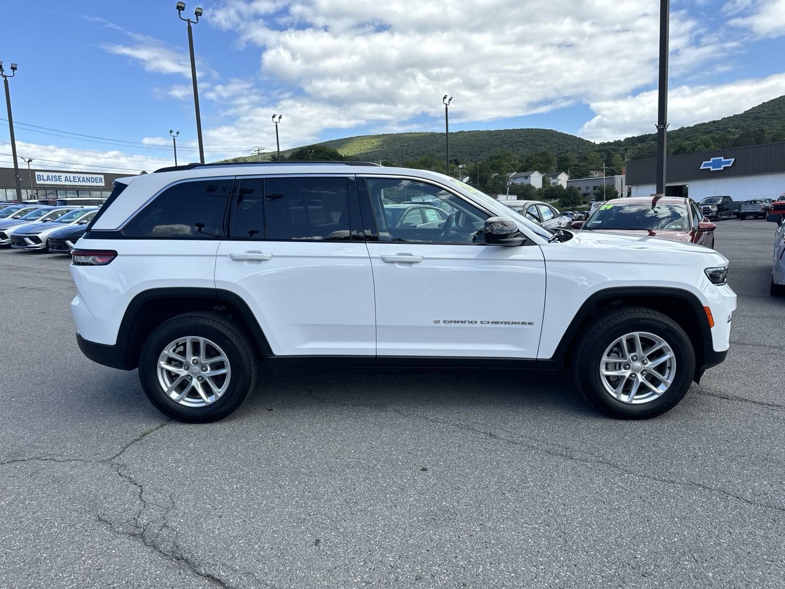 Used 2023 Jeep Grand Cherokee Laredo with VIN 1C4RJHAG7PC671687 for sale in Altoona, PA