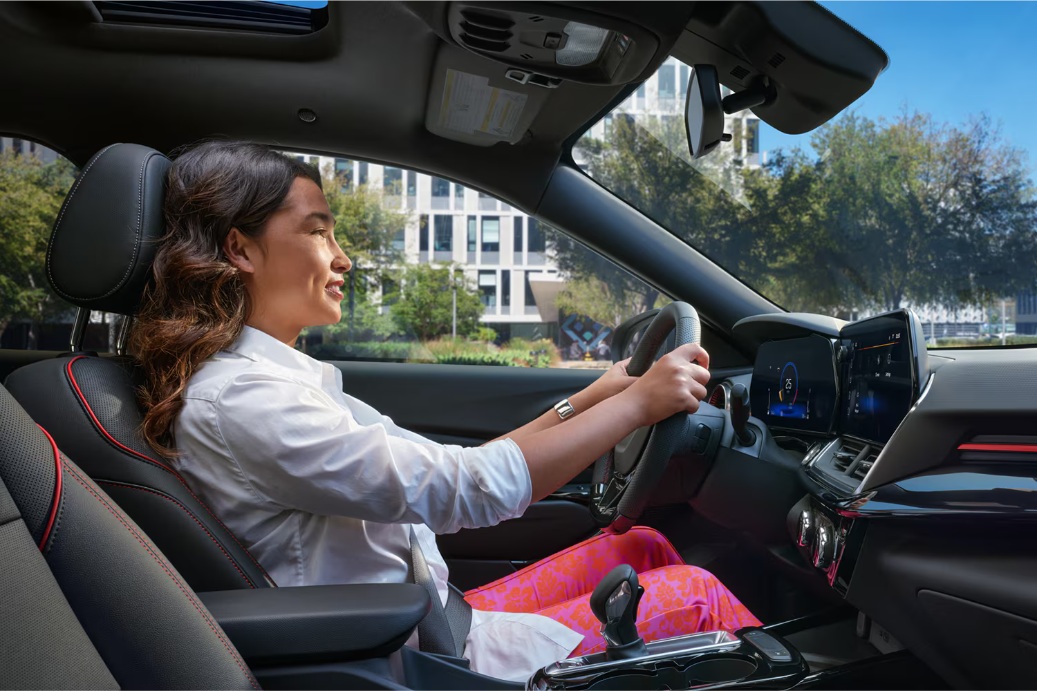 Woman driving a Chevrolet SUV