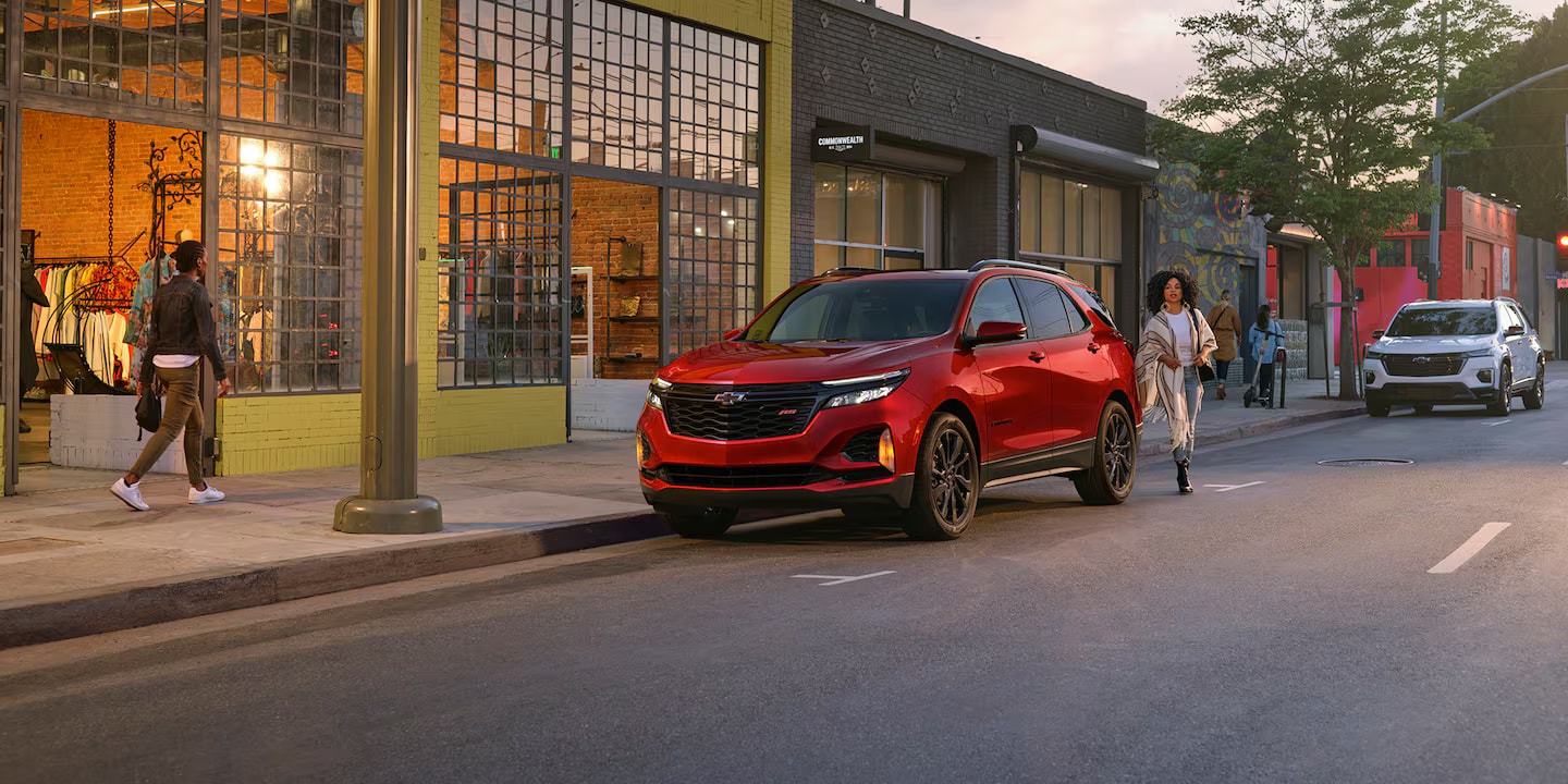 Red 2024 Chevrolet Equinox in a city