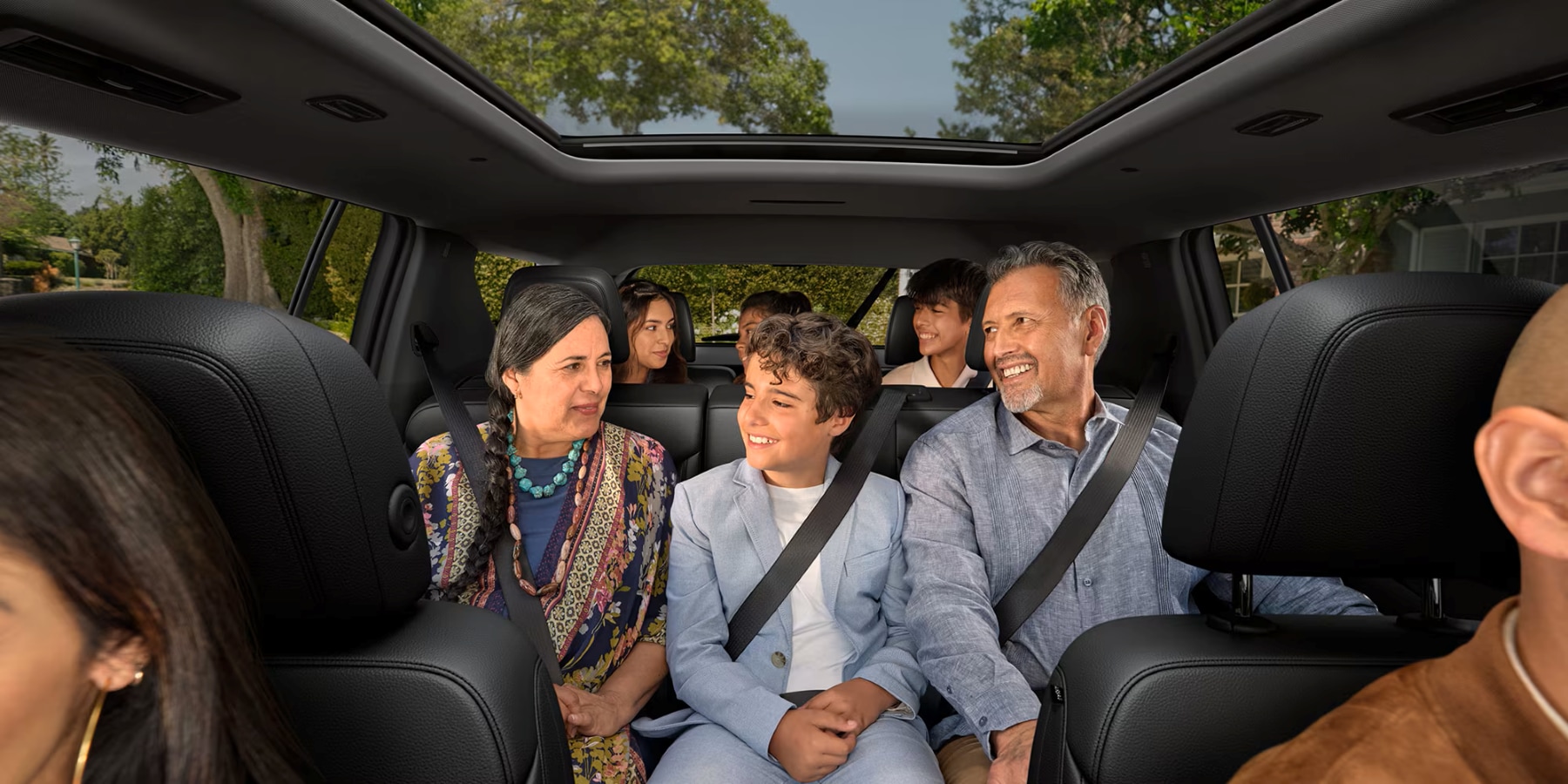 Family sitting inside the 2026 Chevy Traverse
