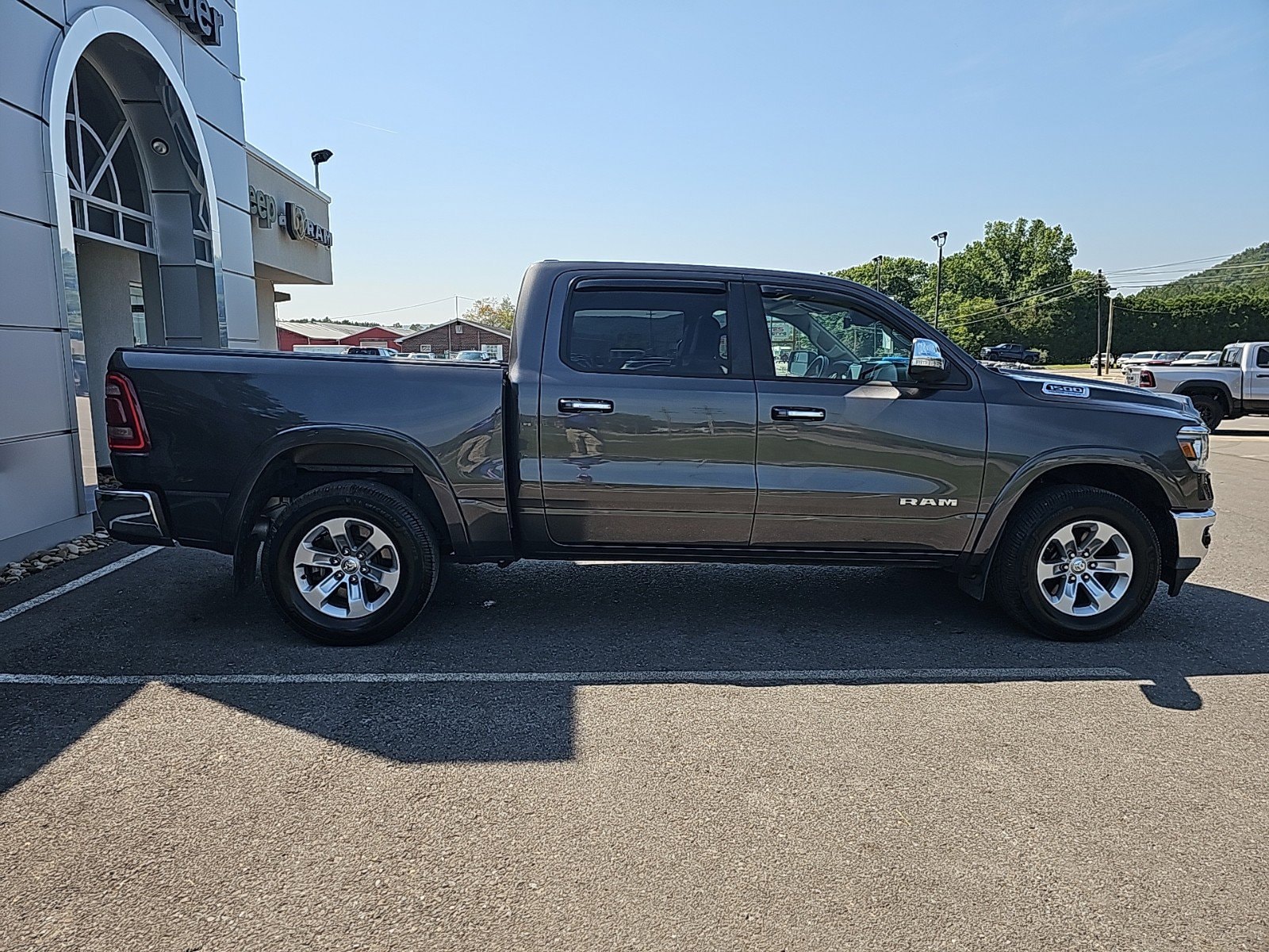 Used 2021 RAM Ram 1500 Pickup Laramie with VIN 1C6SRFJT3MN715946 for sale in Mansfield, PA