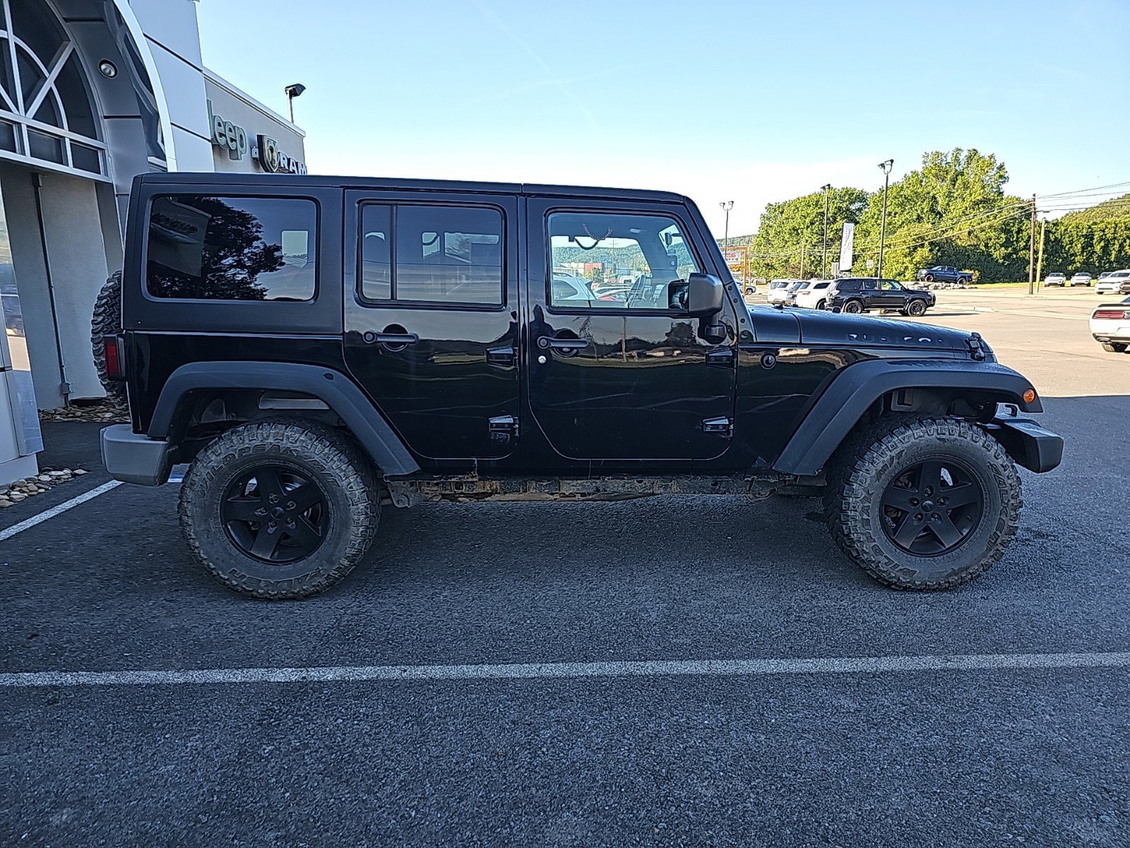 Used 2012 Jeep Wrangler Unlimited Rubicon with VIN 1C4BJWFG2CL121208 for sale in Mansfield, PA