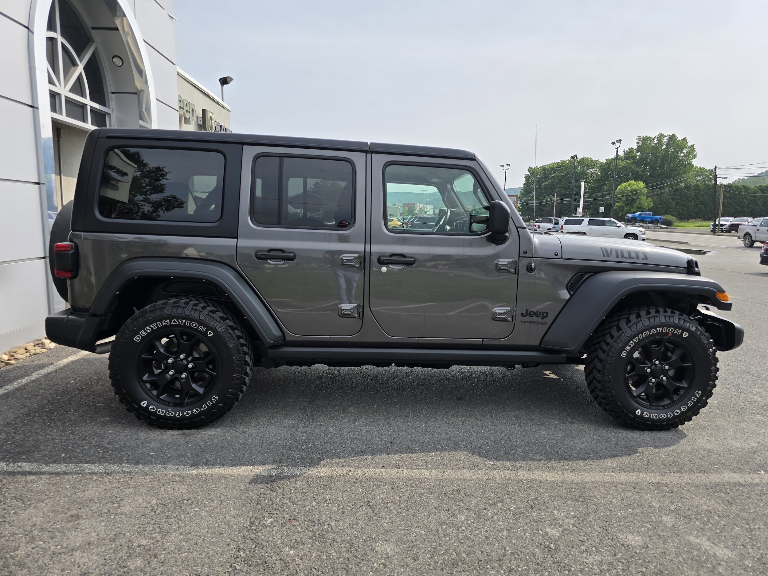 Used 2021 Jeep Wrangler Unlimited Willys with VIN 1C4HJXDG4MW770625 for sale in Mansfield, PA