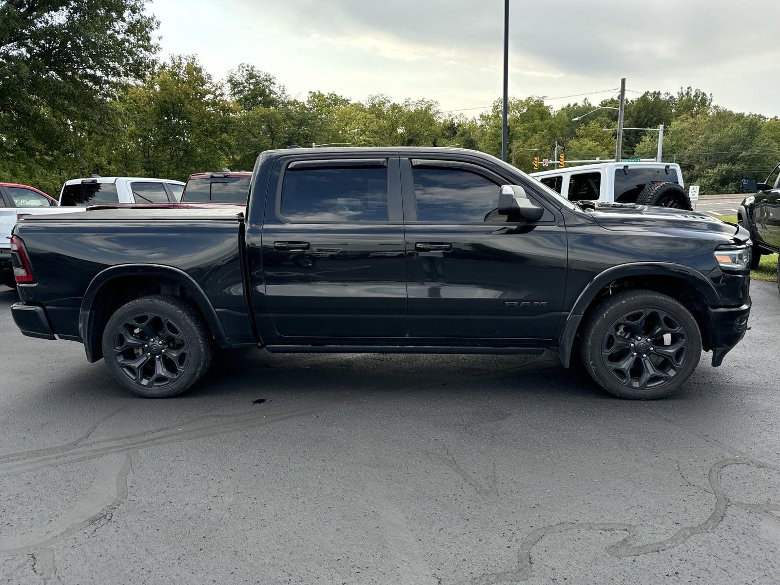 Used 2021 RAM Ram 1500 Pickup Limited with VIN 1C6SRFHT4MN570096 for sale in Lewisburg, PA