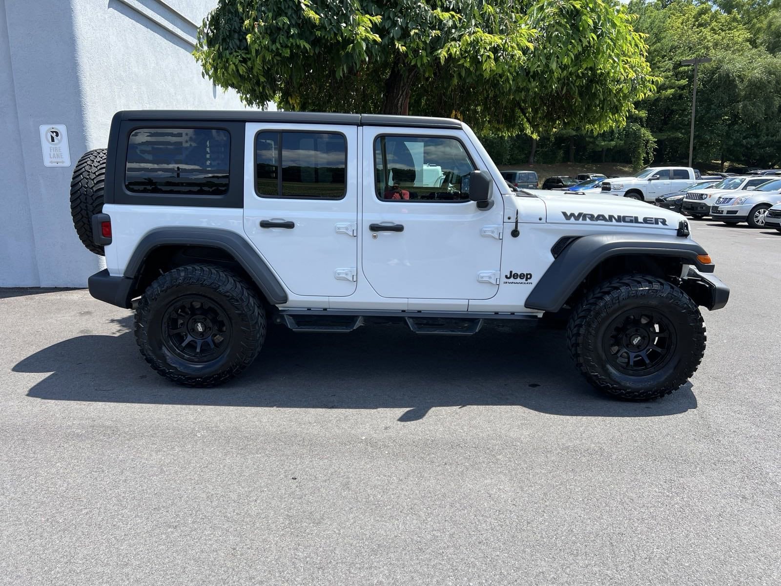 Used 2023 Jeep Wrangler 4-Door Altitude with VIN 1C4HJXDN5PW621837 for sale in State College, PA