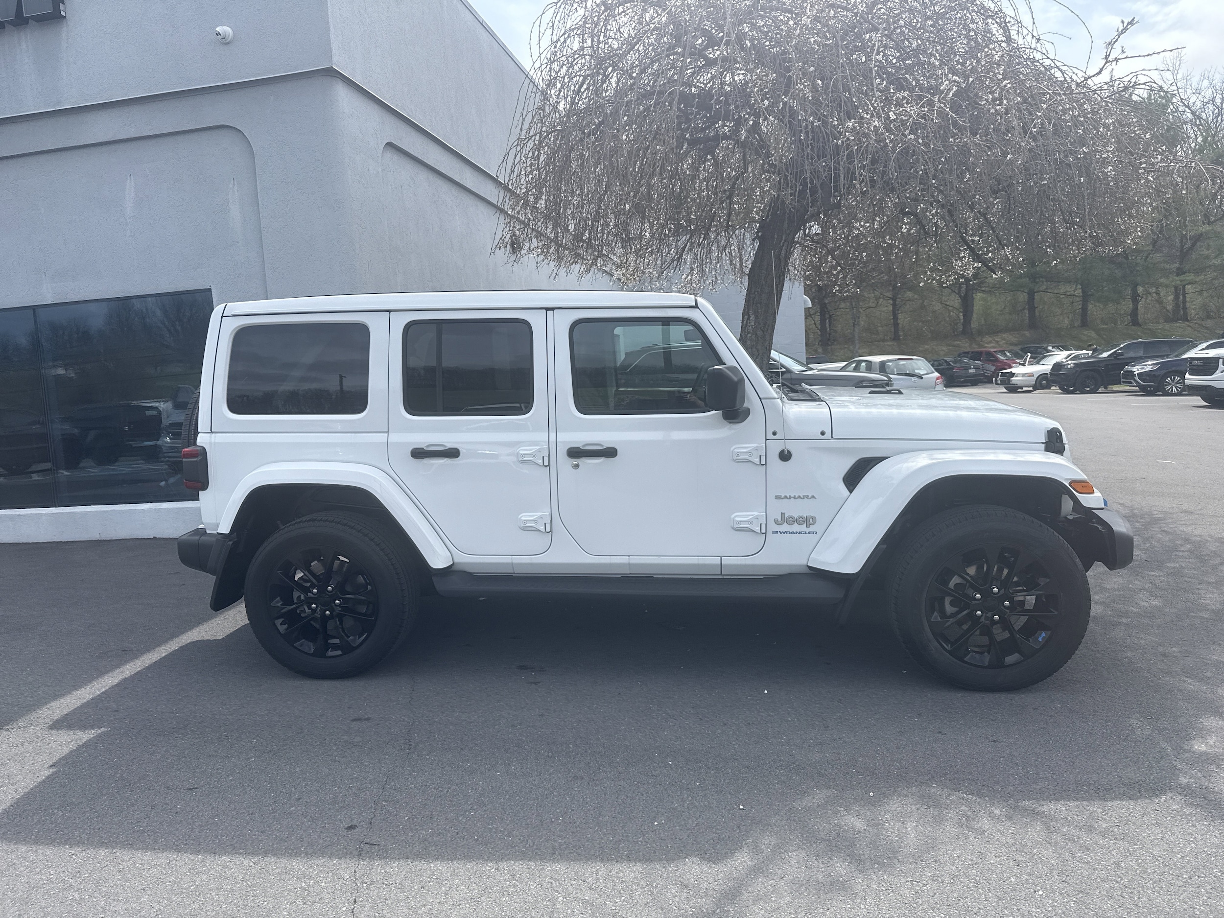 Used 2023 Jeep Wrangler 4xe Sahara 4XE with VIN 1C4JJXP60PW556613 for sale in State College, PA