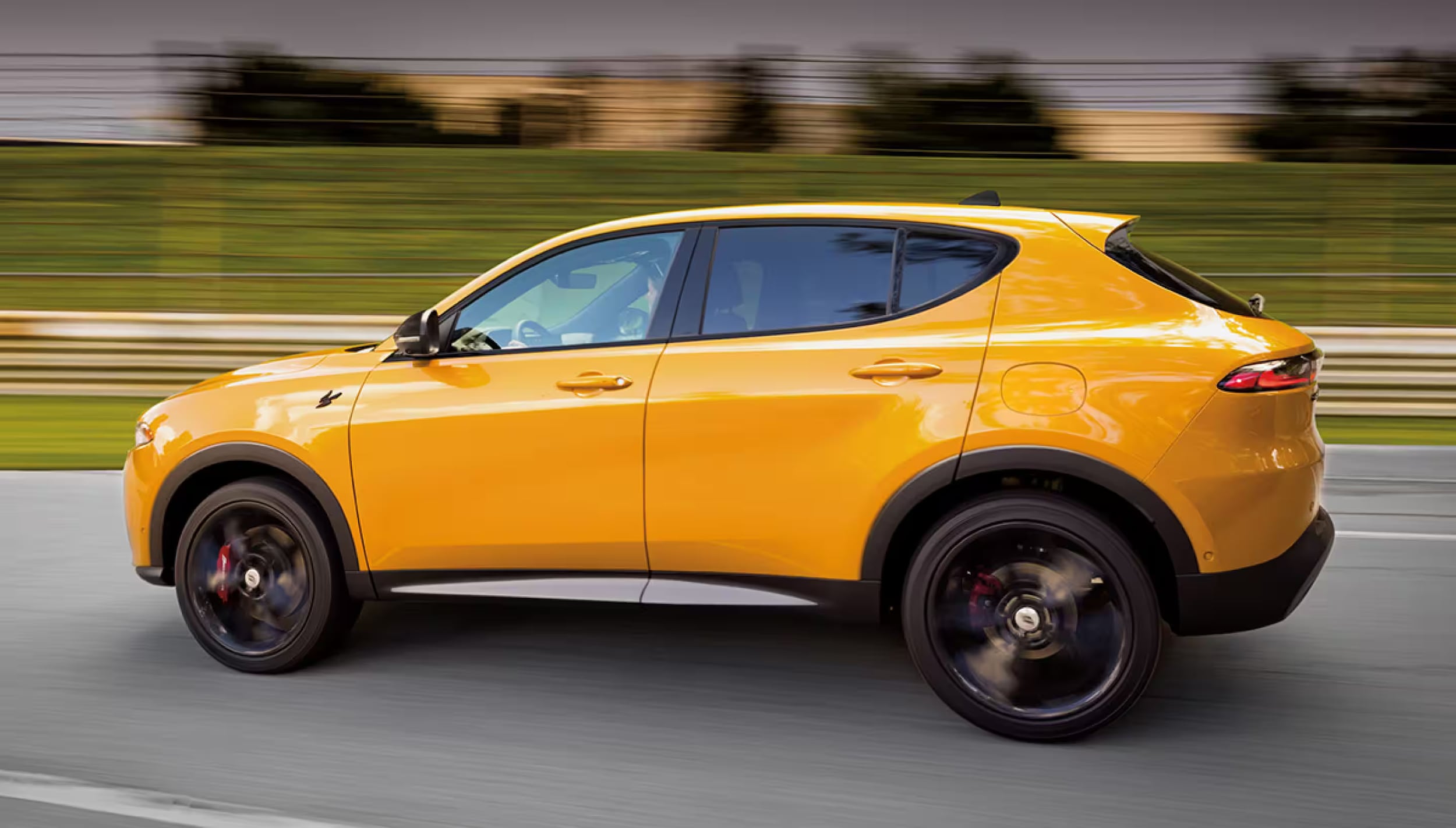 2025-dodge-hornet-yellow-cruising.png