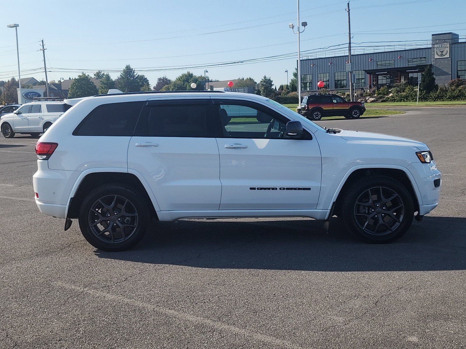 Used 2021 Jeep Grand Cherokee 80th Edition with VIN 1C4RJFBG0MC648380 for sale in Lewisburg, PA