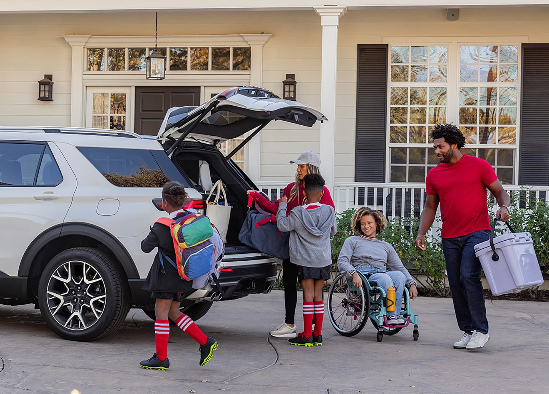 Family loading a 2027 Ford Explorer