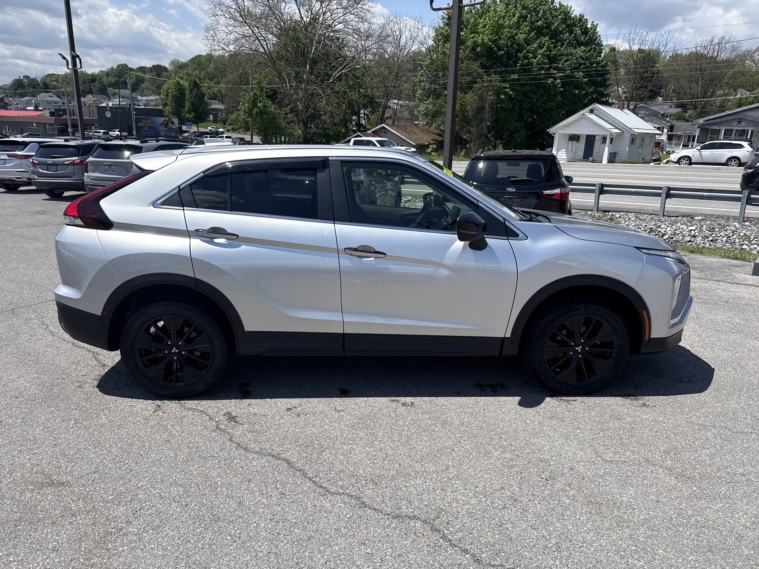 Used 2022 Mitsubishi Eclipse Cross LE with VIN JA4ATVAA6NZ000727 for sale in Altoona, PA