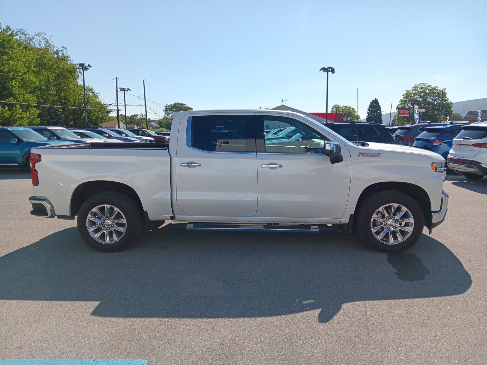 Used 2021 Chevrolet Silverado 1500 LTZ with VIN 3GCUYGEDXMG135180 for sale in Montoursville, PA