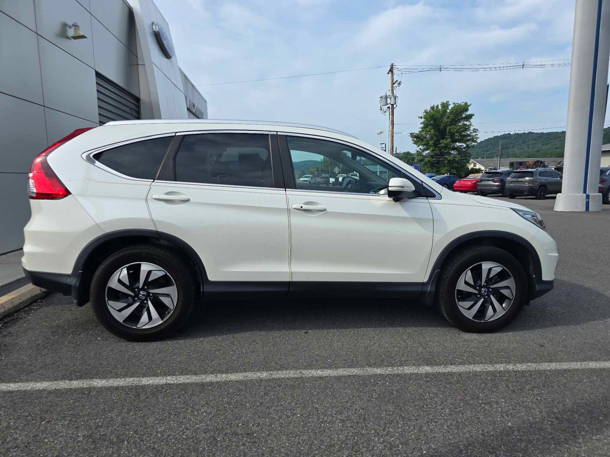 Used 2015 Honda CR-V Touring with VIN 5J6RM4H9XFL114093 for sale in Mansfield, PA