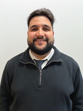 Staff member Samuel C from ID_9431a9df6f02