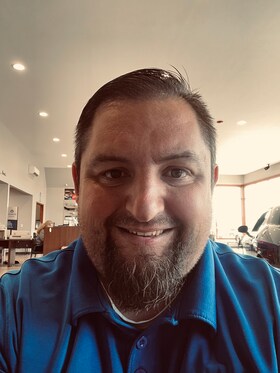 Staff member John Wilson Jr. from 922e20d7fb77