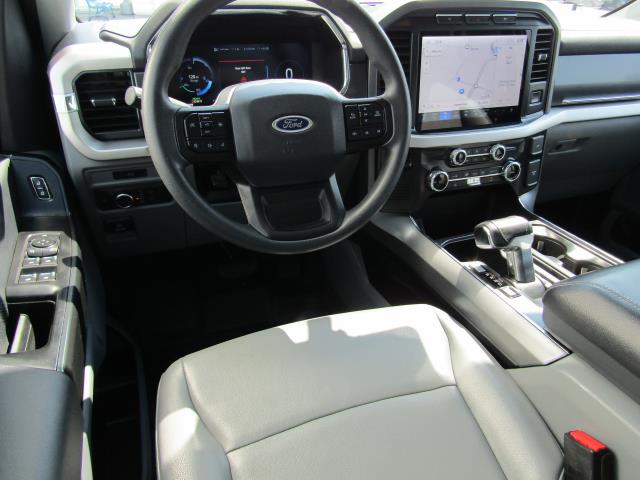 Certified 2022 Ford F-150 Lightning XLT with VIN 1FT6W1EV6NWG06622 for sale in Chippewa Falls, WI