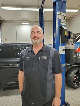 Staff member John Sauerbrunn, BMW Technician from 68d914966809