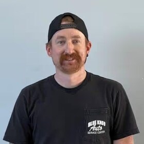 Staff member Alex Gates from ID_058391