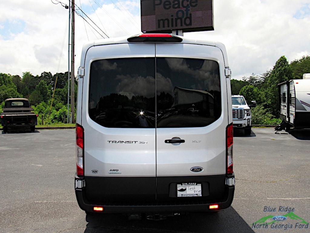 New 2025 Ford Transit Passenger Wagon T-350 148 Med Roof XLT AWD 15 Passenger Full-size Passenger Van