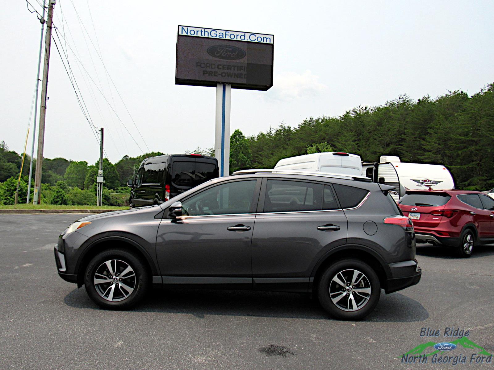 Used 2018 Toyota RAV4 XLE with VIN 2T3WFREV0JW516339 for sale in Mineral Bluff, GA
