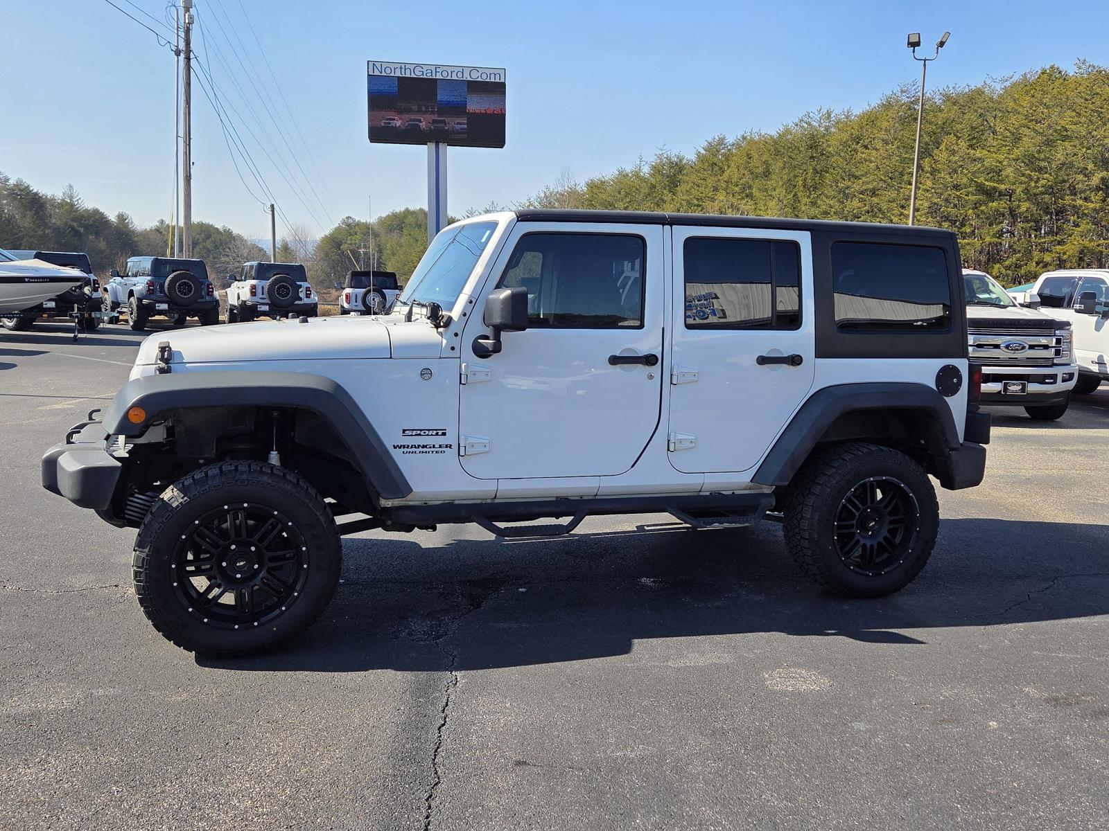 Used 2013 Jeep Wrangler Unlimited Sport with VIN 1C4BJWDG0DL705305 for sale in Mineral Bluff, GA