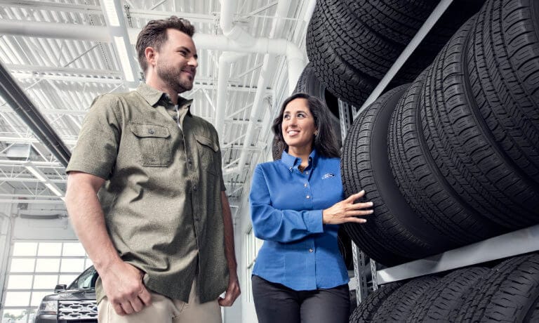 Ford Tire Center customer looking at tire options