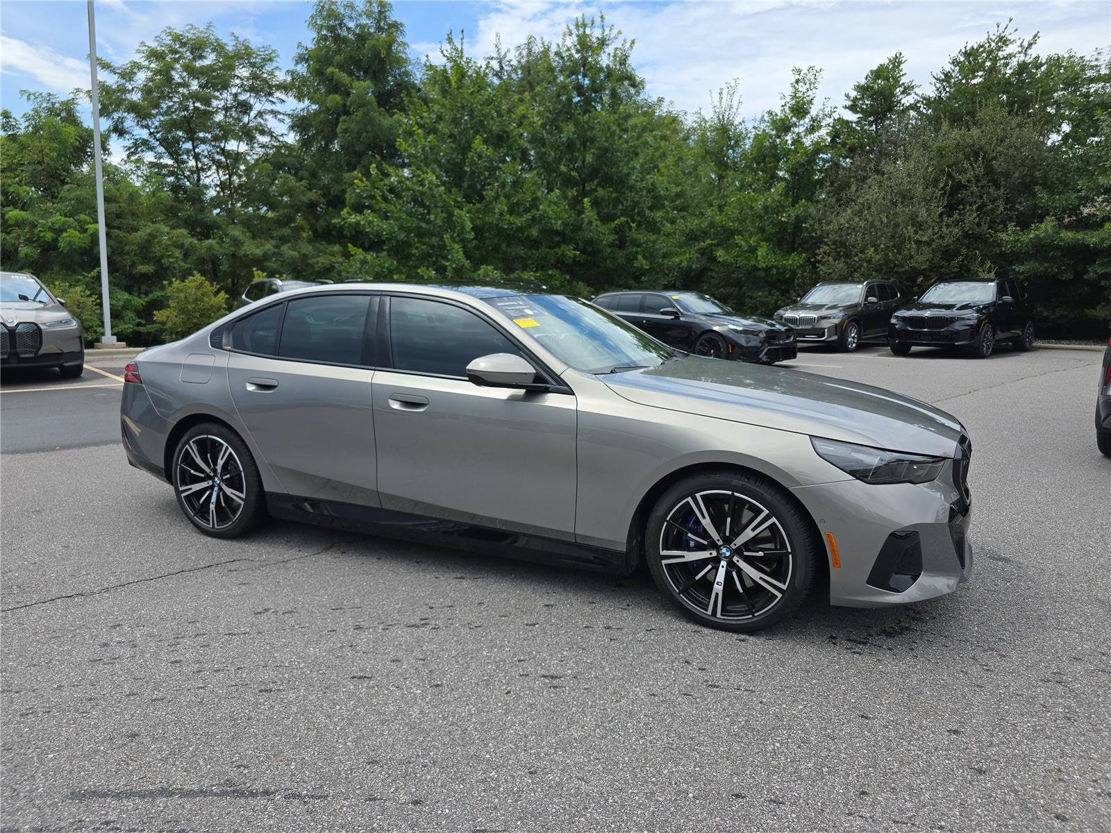 Oxide Gray Metallic 2026 BMW 5 Series Sedan All-Wheel Drive 8-Speed Automatic