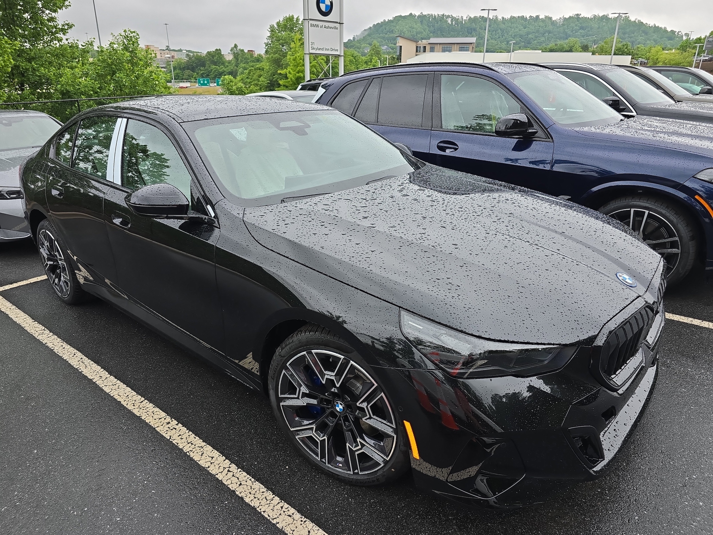2027 BMW 5 Series 550e xDrive Sedan's photo