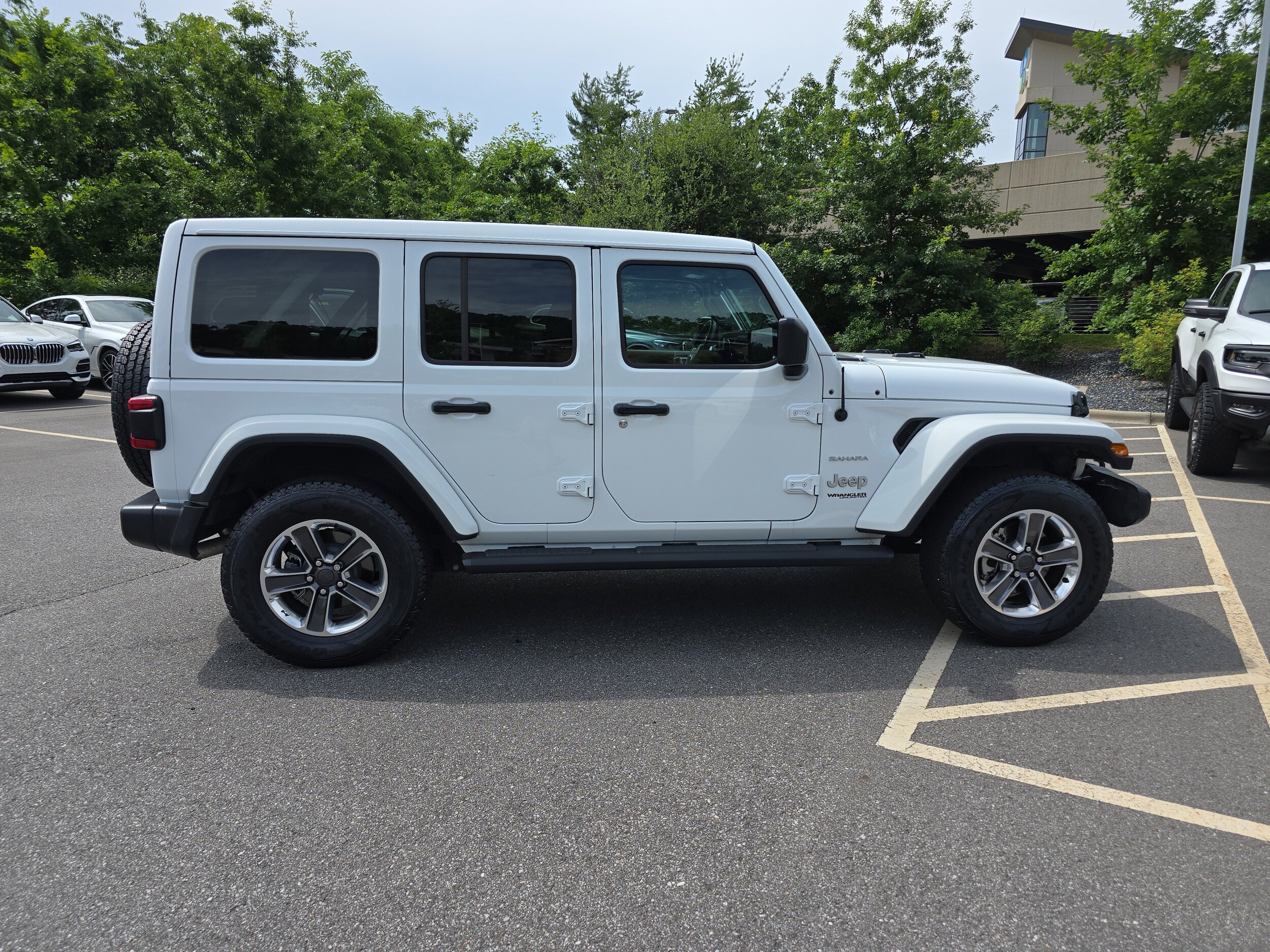 Used 2021 Jeep Wrangler Unlimited Sahara with VIN 1C4HJXEN2MW687868 for sale in Arden, NC