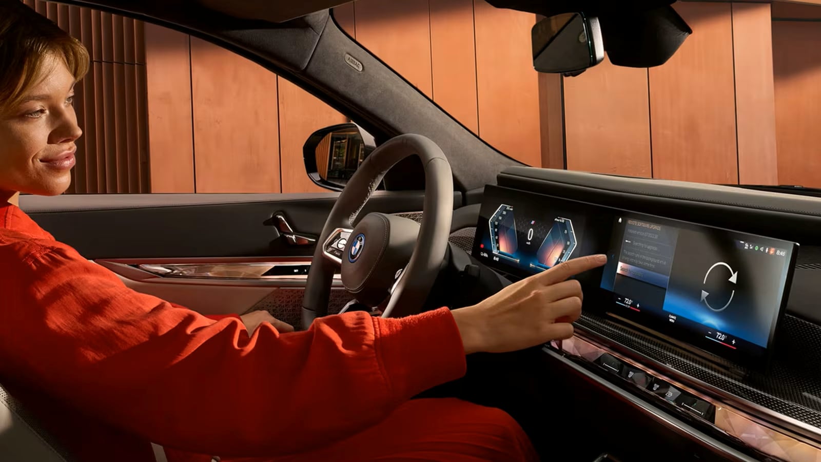 Woman using BMW ConnectedDrive 