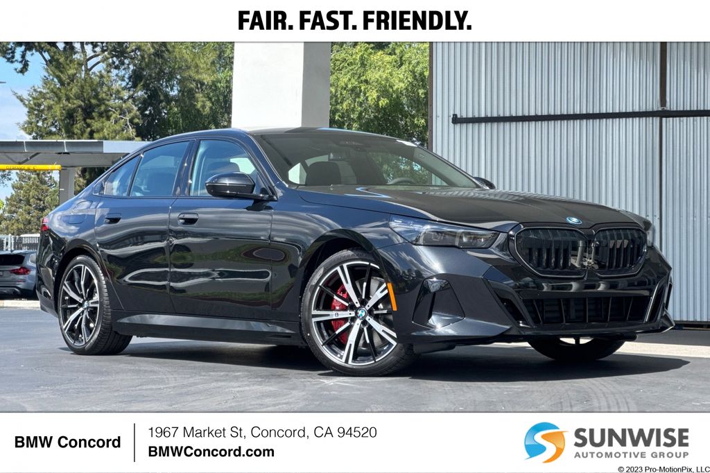 2026 BMW 5 Series 550e xDrive Sedan's photo