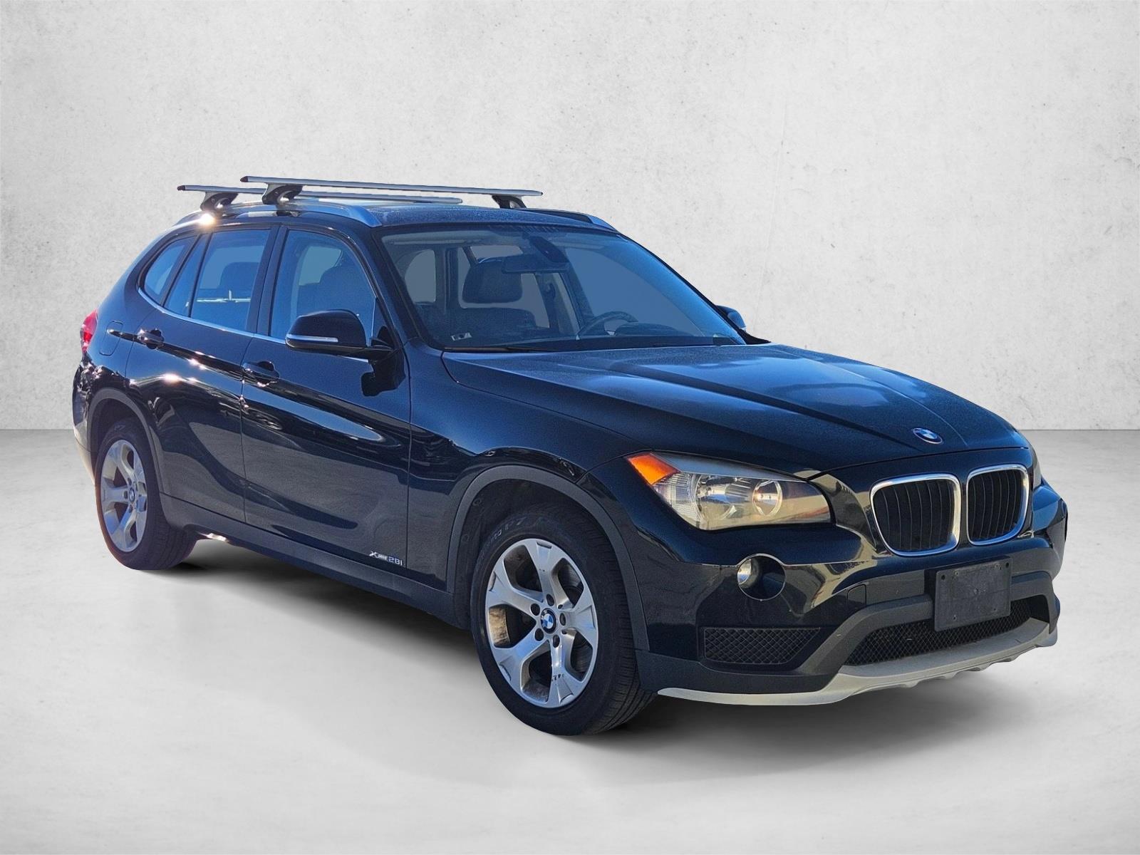 Used 2015 BMW X1 28i with VIN WBAVM1C57FV317435 for sale in Carlsbad, CA