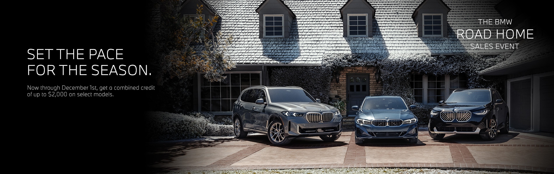 BMW X5, 3 Series, and X3 parked in a driveway of
a holiday decorated home.