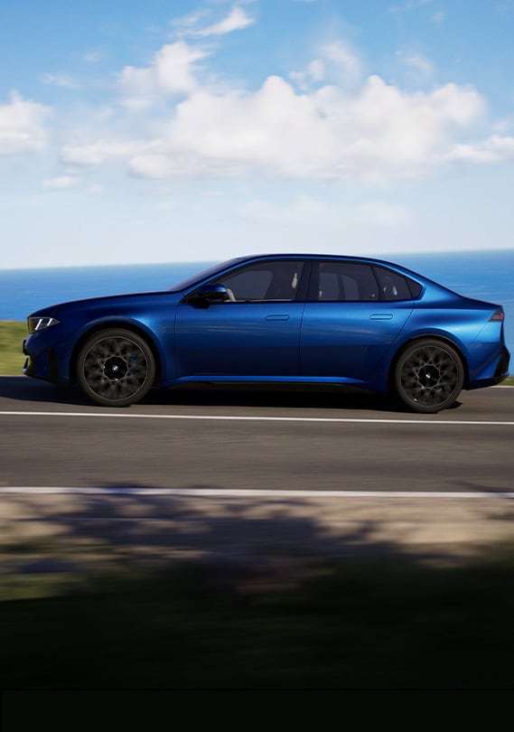 Motion image of BMW i3 driving, side view.