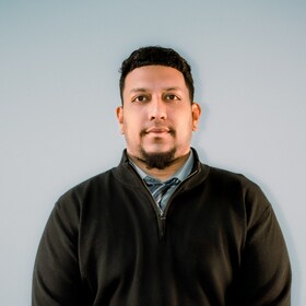 Staff member Andrew Dhanpaul from ID_41edfb