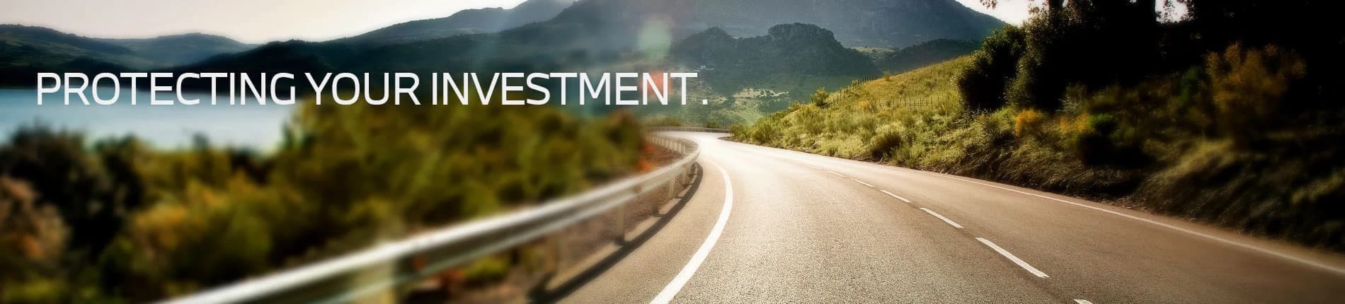 Banner image with PROTECTING YOUR INVESTMENT text overlaying a winding road