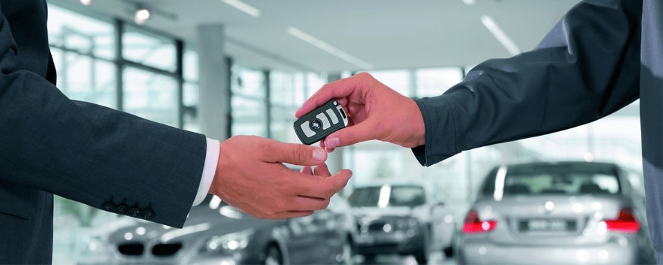 Customer handing back their BMW keys
