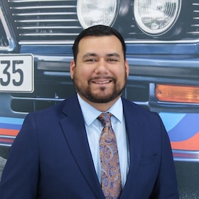 Staff member George J. from ID_72d1c2d43eae