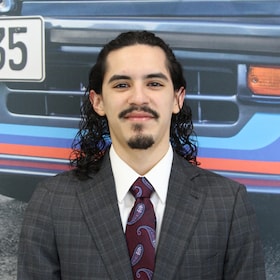 Staff member Dominic T. from ID_72d1c2d43eae