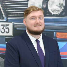 Staff member Zachary S. from ID_72d1c2d43eae