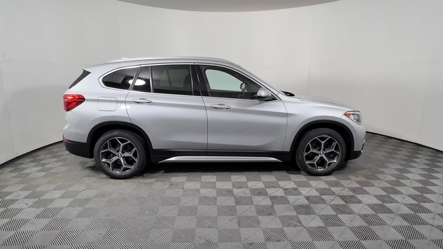 Used 2019 BMW X1 28i with VIN WBXHU7C57K5L09822 for sale in Columbia, MO