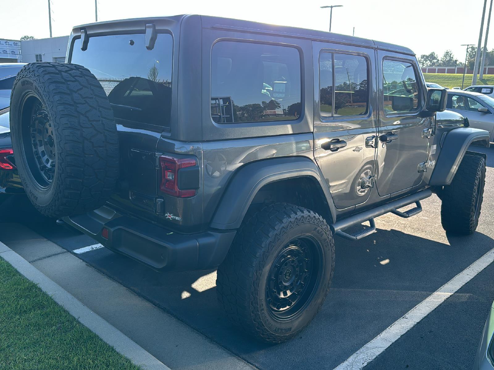 Used 2020 Jeep Wrangler Unlimited Freedom with VIN 1C4HJXDG0LW274607 for sale in Columbus, GA