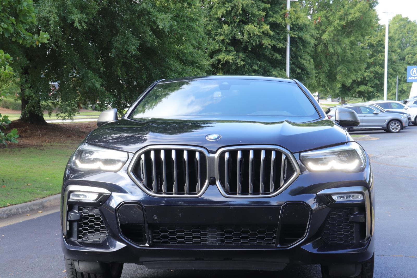 Used 2020 BMW X6 M50i with VIN 5UXCY8C01L9B71261 for sale in Columbus, GA