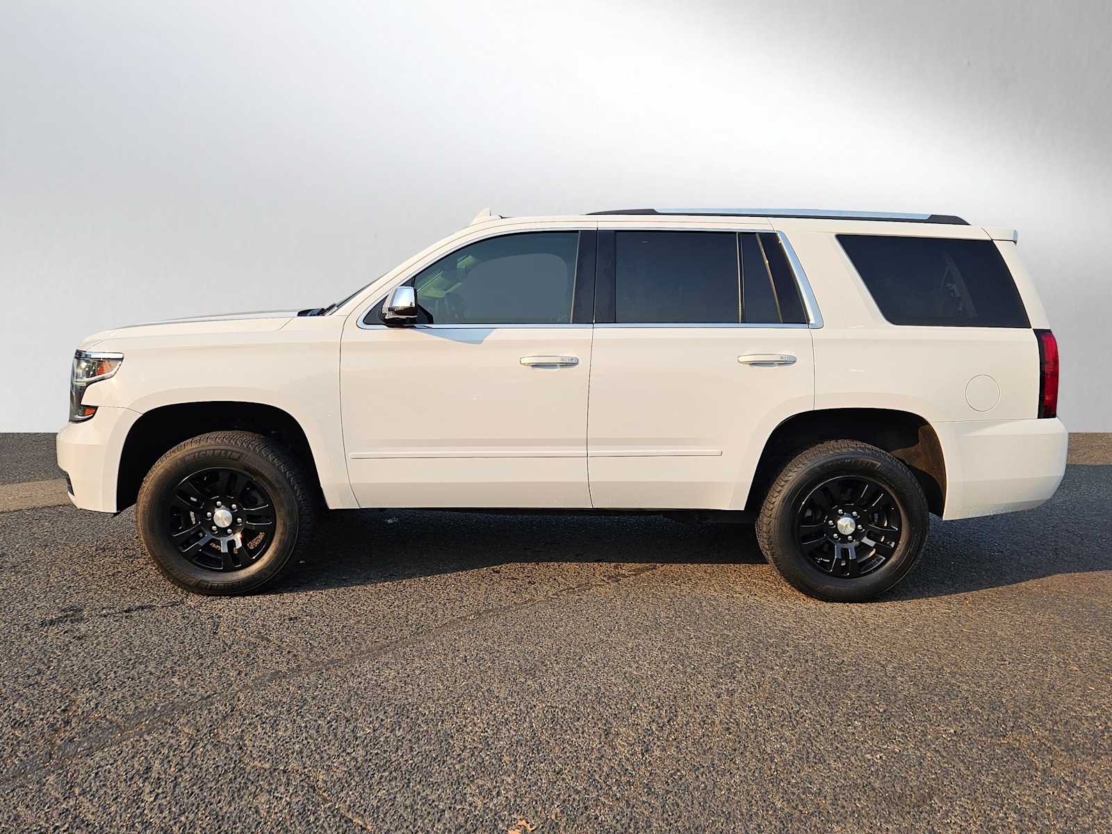 Used 2016 Chevrolet Tahoe LTZ with VIN 1GNSKCKC7GR321946 for sale in Eugene, OR