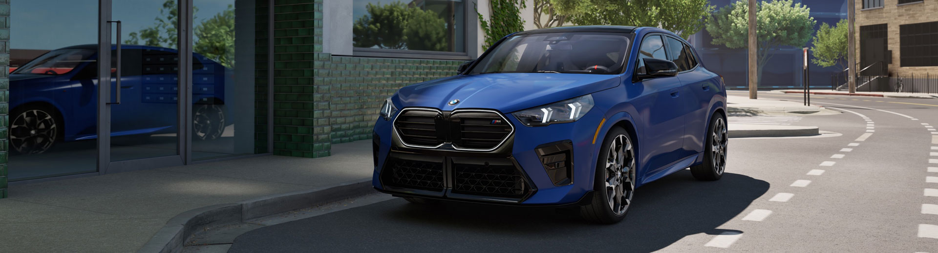 2025 BMW X2 in Portimao Blue Metallic parked on a city street.